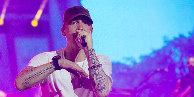 Eminem has revealed he felt threatened by Kanye West.