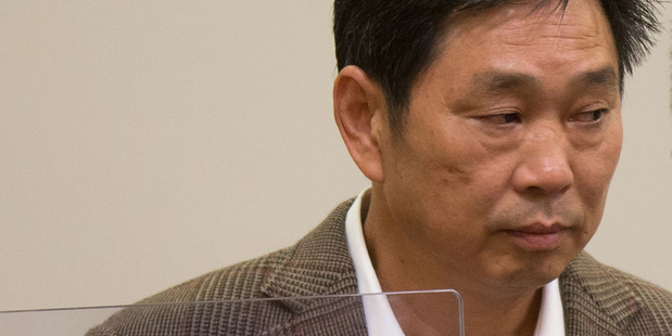 Donghua Liu in the Auckland District Court today. Photo / Richard Robinson