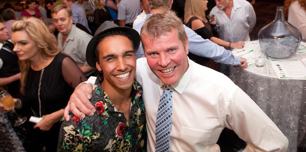 Titanium pop group member Jordi Webber with Rotorua New World owner operator Greg Dyson, who purchased him at the Supper Club event. Photo/Ben Fraser