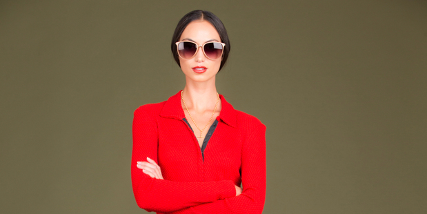 Anne Mardell top, $197. Nine-carat gold fob chain, $1299, from Stewart Dawsons. Le Specs sunglasses, $70. Photo / Greg Bowker