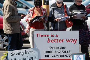 Anti abortion protestors outside a medical clinic in Dominion Road, Auckland. Photo / Doug Sherring