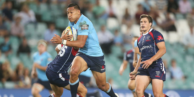 Israel Folau could barely speak after copping a stray elbow in the Waratahs' win over the Melbourne Rebels. Photo / Getty Images