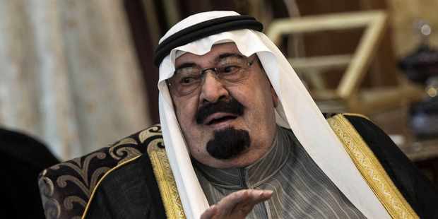 Saudi Arabia's King Abdullah speaks with US Secretary of State John Kerry. Photo / AP