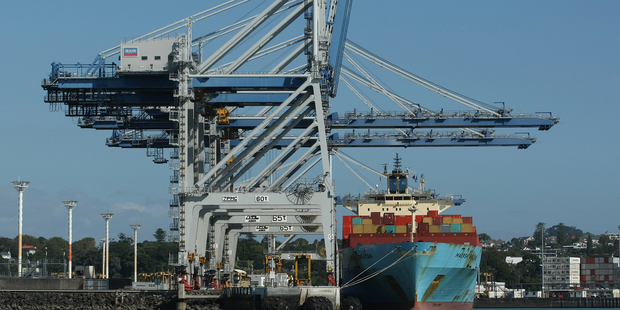 A container ship is unloaded at Ports of Auckland. Terms of trade are at a 40-year high, the NZ dollar is overvalued by between 5 and 15pc, says the IMF. Photo / Greg Bowker