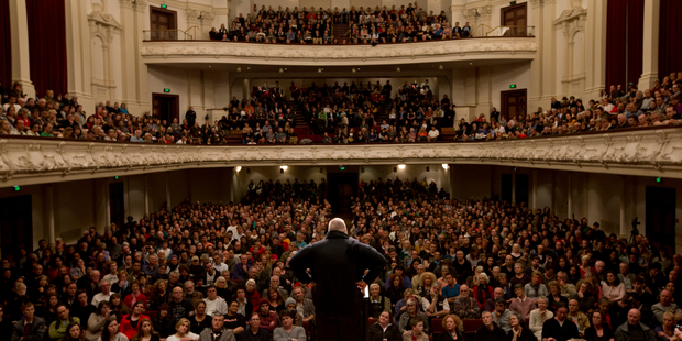 Kim Dotcom speaking to the masses. Photo / Brett Phibbs