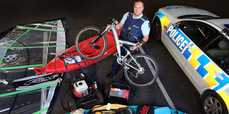 Constable Joseph Reuben is trying to find the owners of these stolen items. Photo/John Stone