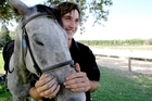 Josh Flannagan, 20, has found his place tending and looking after horses at the Trinity Valley riding school after years of bullying at school. Photo/Ruth Keber Josh Flannagan, 20, has found his place tending and looking after horses at the Trinity Valley riding school after years of bullying at school. Photo/Ruth Keber