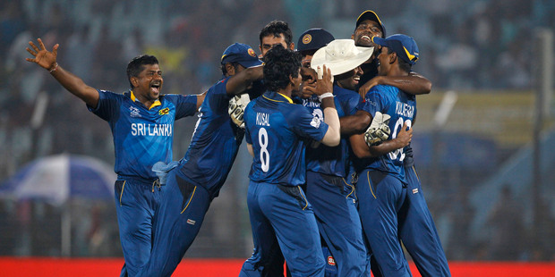 Sri Lanka players celebrates their victory against New Zealand. Photo / AP