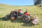The tractor that rolled on a Welcome Bay property, seriously injuring the 71-year-old driver. Photo/John Borren The tractor that rolled on a Welcome Bay property, seriously injuring the 71-year-old driver. Photo/John Borren