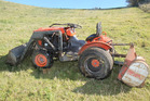 A tractor rolled on a Welcome Bay property injuring the driver this morning. Photo/John Borren A tractor rolled on a Welcome Bay property injuring the driver this morning. Photo/John Borren