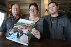 Colin and Marianne Milne and their son Lance with a picture of son/brother Brad Milne, who committed suicide three years ago, and his son Cole. Colin and Marianne Milne and their son Lance with a picture of son/brother Brad Milne, who committed suicide three years ago, and his son Cole.