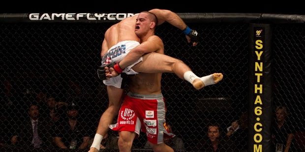 James Te Huna (red shorts) says the June fight at Vector Arena will be a dream come true. Photo / Getty Images
