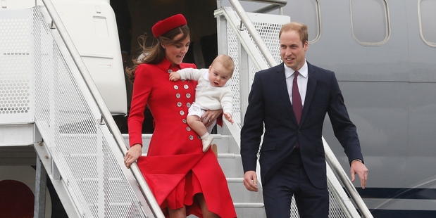 William and Kate step off the Airforce plane yesterday with baby George.