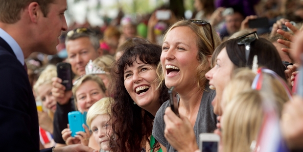 Prince William won many hearts in Cambridge, where 15,000 to 20,000 turned out to greet him and wife Kate. Some had waited for up to eight hours. Photo / Pool