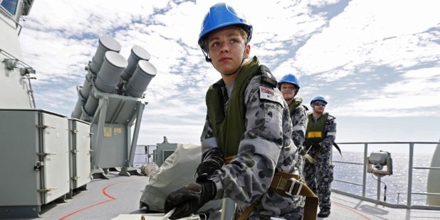 Able Seaman Marine Technician, Hannah Nadalini heaves on the distance line. Photo / AFP/AUSTRALIAN DEFENCE/ABIS NICOLAS GONZALEZ