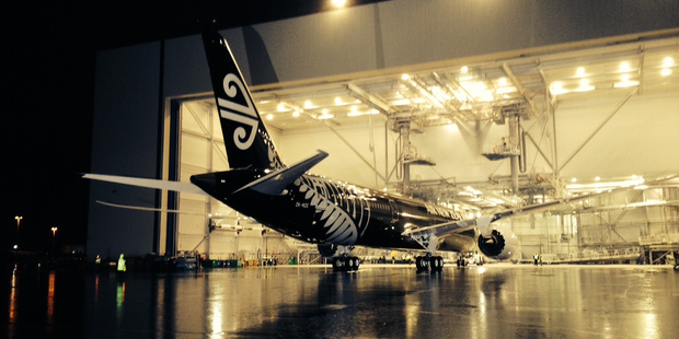 The Air New Zealand 787-900 painted in black is moved out of the Boeing painting hangar in Seattle. Photo / Brett Phibbs
