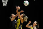 Leana de Bruin of the Magic and Irene van Dyk of the Pulse battle for the ball. Photo / Christine Cornege Leana de Bruin of the Magic and Irene van Dyk of the Pulse battle for the ball. Photo / Christine Cornege