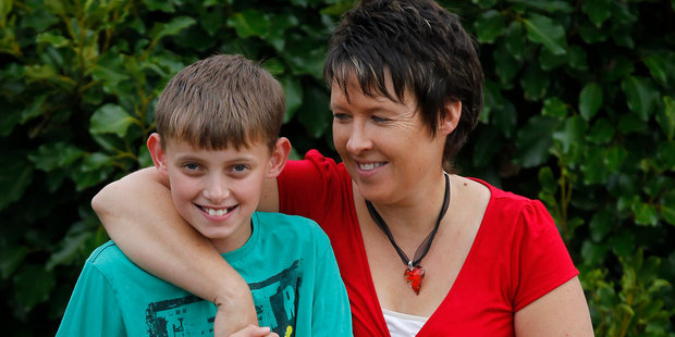 Anita Stokes with her son Cameron. Anita went through menopause at 29 and had twin boys through an egg donor. Photo / Christine Cornege