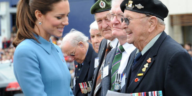 Catherine, Duchess of Cambridge talks with second world war veteran Wilton Sterritt after a wreathlaying ceremony in Seymour Square, Blenhiem. Photo / AP