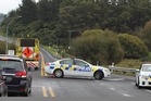 Police close part of SH2 after a diesel spill near Te Puna. Photo/John Borren Police close part of SH2 after a diesel spill near Te Puna. Photo/John Borren