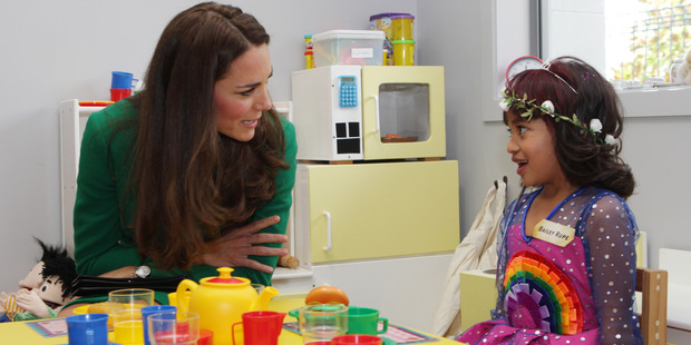 Catherine talks with Bailey Rupe in the play room.