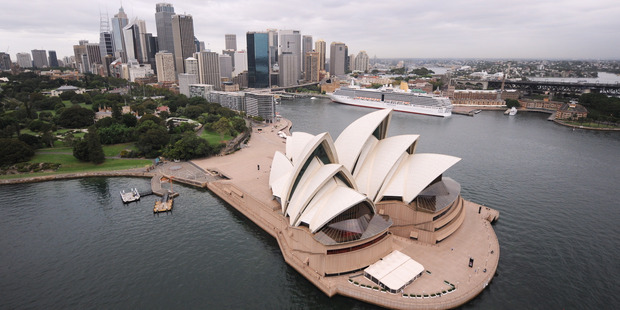 The Sydney Opera House with the cruise ship Arcadia in the background.