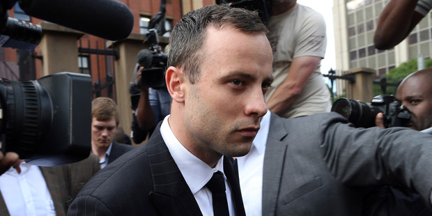 Oscar Pistorius leaves the high court in Pretoria, South Africa. Photo / AP