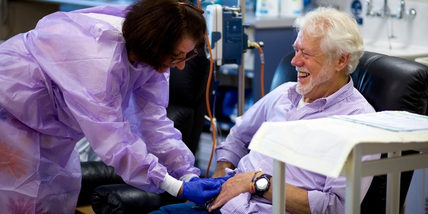 Patient Phillip Melchior receives treatment from staff nurse Anne Carey at the haematology day centre at Auckland City Hospital. Photo / Dean Purcell