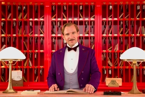 Ralph Fiennes plays the caddish Monsieur Gustave.