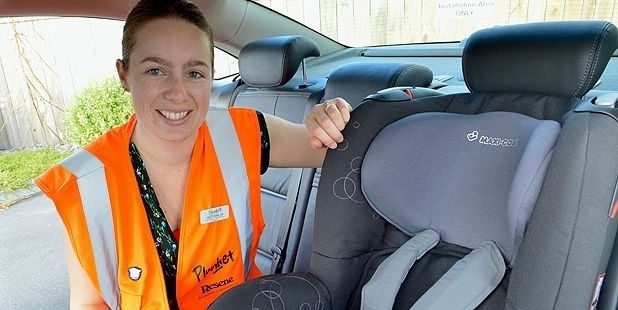 Aethalia O'Connor of Plunket with the car seat installed facing forward in the royal limo. Photo / Plunket