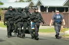 Police allege two officers were bitten after an armed offenders squad search in Marewa on Friday. Photo/Warren Buckland Police allege two officers were bitten after an armed offenders squad search in Marewa on Friday. Photo/Warren Buckland