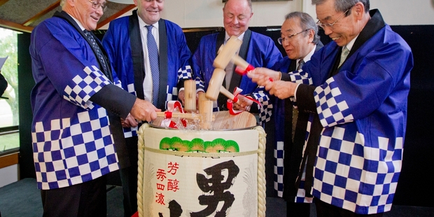 MOMENTOUS: Celebrating Pan Pac's $70 million refurbishment are its managing director Doug Ducker (left), Economic Development Minister Steven Joyce, Tukituki MP Craig Foss, Japan ambassador to New Zealand Yasuaki Nogawa and Pan Pac owner Oji Holdings' chairman Kazuhisa Shinoda. PHOTO/GLENN TAYLOR HBT140881-13