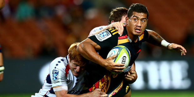 Augustine Pulu of the Chiefs is tackled by Nic Stirzaker of the Rebels during the round nine Super Rugby match between the Chiefs and the Rebels. Photo / Getty Images.