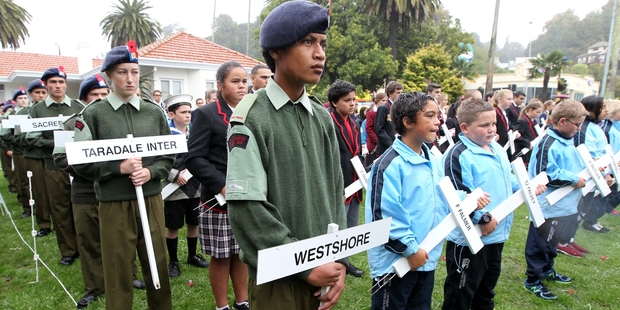 Napier cadets and children from 22 schools across the region prepare to place the commemorative crosses at Memorial Square. Photo/Duncan Brown