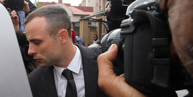 Oscar Pistorius leaves the high court in Pretoria, South Africa. Photo / AP