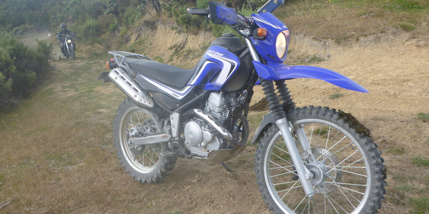 Yamaha's latest XT250 includes wider Renthal bars, hand guards, lowered gearing and a luggage rack.Pictures / Jacqui Madelin
