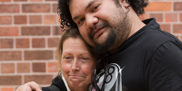Gail Lees receives a hug from her deceased brothers flatmate and landlord Koro Erika. Photo / Greg Bowker