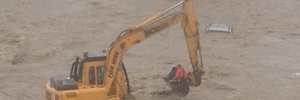 A woman is rescued from the roof of her car after the Kakanui River in Otago flooded. Photo / Otago Rescue Helocopter