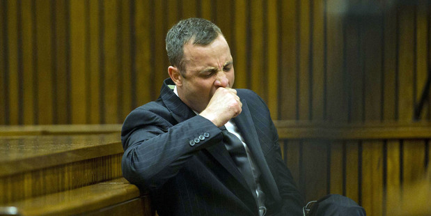 Oscar Pistorius yawns as he listens to forensic evidence being given in court in Pretoria. Photo / AP