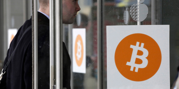 A man enters a Bitcoin conference and trade show held in New York earlier this month. Photo / AP