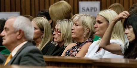 June Steenkamp, center wearing glasses, mother of the late Reeva Steenkamp, listens as state prosecutor Gerrie Nel questions Oscar Pistorius. Photo / AP