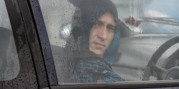 DENYING CHARGES: Darryl Cox leaving Masterton District Court on Thursday. PHOTO/ANDREW BONALLACK