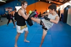 Cody Thomson, right, during a training session with Luke Meredith for the Muay Thai World Championships. Photo/Glenn Taylor Cody Thomson, right, during a training session with Luke Meredith for the Muay Thai World Championships. Photo/Glenn Taylor