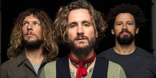 John Butler (left) brings his earthy, guitar-based songs to Auckland tomorrow along with bandmates Grant Gerathy and Byron Luiters.