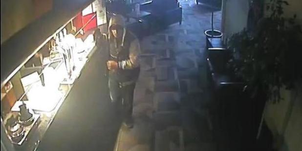 The offender threw the employee a black bag and told her to fill it with money. Photo: Supplied