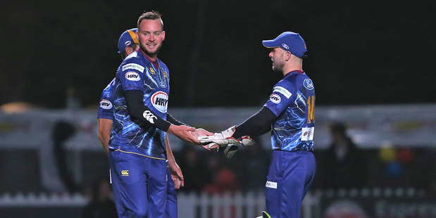 Mark Craig celebrates a wicket for Otago. Photo / Getty Images