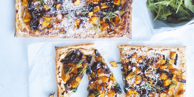 Pumpkin, caramelised onion and rosemary free-form tarts. Photo / Donna Hay Magazine