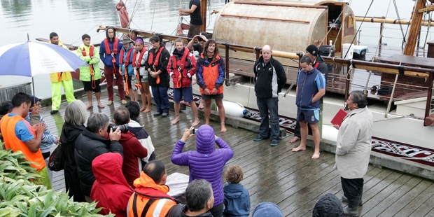 The waka crew during a karakia just before Te Waka Te Matau a Maui left Napier's West Quay for the Chatham Islands. Photo/Paul Taylor