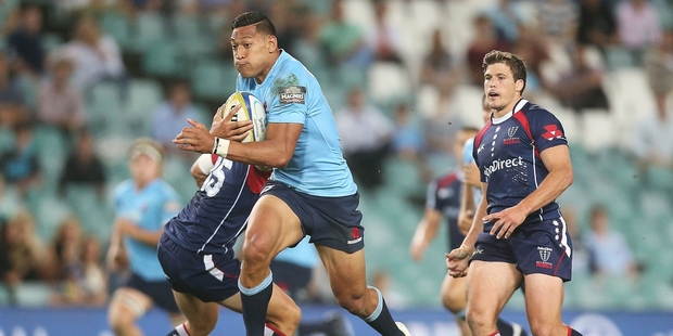 Israel Folau's stride seems a bit longer than that of others, especially when he's beating the tackle. Photo / AP