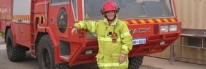Leanne Rose of Whangarei in front of a fire truck in Perth where she volunteers as an emergency services co-ordinator while working full-time at a nickel mine. Photo/Supplied